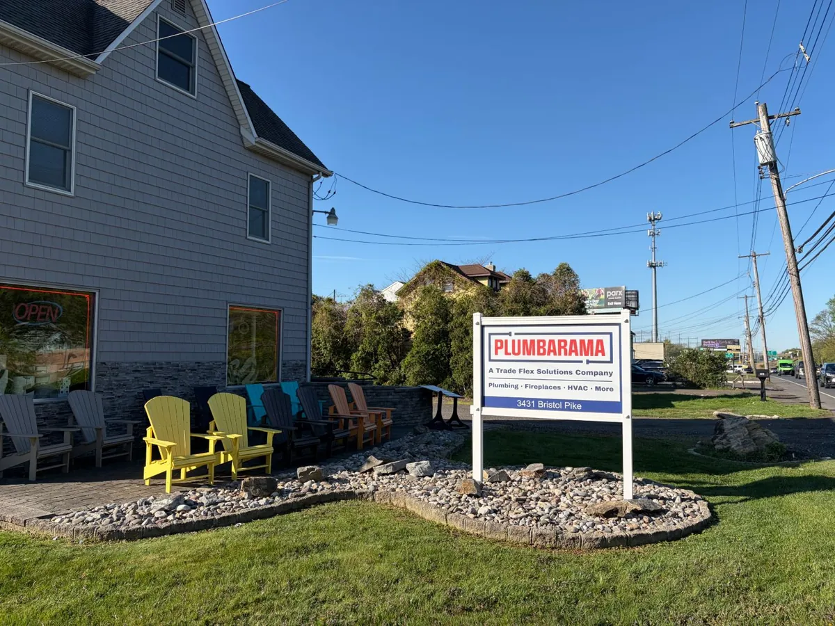 Plumbarama sign at 3431 Bristol Pike in Bensalem, PA, reading A Trade Flex Solutions Company: Plumbing, Fireplaces, HVAC, More